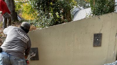 An Anglin's crew on a retaining wall repair job