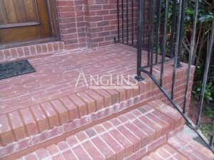 outdoor brick steps after levelling and mortar repair