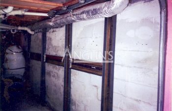 steel support beams in a basement of a bulding