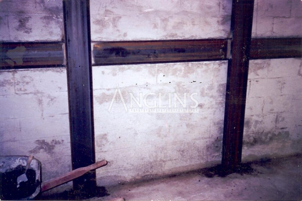 steel support beams in a basement of a bulding