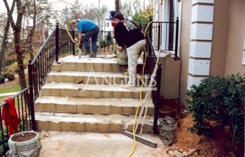 anglin's team preparing sagging stoops for repair
