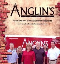 anglin's family with company logo in the background