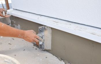 Contractor repairing foundation