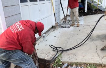 Anglin's foundation repair specialists at work.