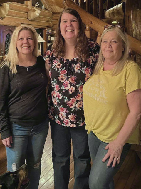 Risa Anglin (middle) with sisters Shelly (left) and Sherry (right)